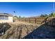 Backyard area with wooden fence at 7430 Buchanan Dr, Port Richey, FL 34668