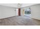 Bedroom with pool view and sliding glass doors at 7430 Buchanan Dr, Port Richey, FL 34668