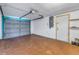 Attached garage with brick flooring at 7430 Buchanan Dr, Port Richey, FL 34668