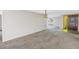 Spacious living room with view of front entrance at 7430 Buchanan Dr, Port Richey, FL 34668