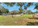 Large backyard with garden beds and a shed at 11305 Sweet Bay Ct, Riverview, FL 33569