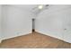 Bright bedroom with wood-look tile floors and walk-in closet at 11305 Sweet Bay Ct, Riverview, FL 33569