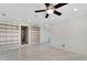 Bonus room with built-in shelving and tile flooring at 11305 Sweet Bay Ct, Riverview, FL 33569