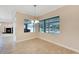 Bright dining room with large window and chandelier at 11305 Sweet Bay Ct, Riverview, FL 33569