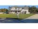Two-story house with a large yard, driveway, and mailbox at 11305 Sweet Bay Ct, Riverview, FL 33569