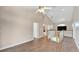 Upstairs hallway with vaulted ceilings and wood-look tile flooring at 11305 Sweet Bay Ct, Riverview, FL 33569
