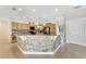 Kitchen boasts an island and stone backsplash at 11305 Sweet Bay Ct, Riverview, FL 33569
