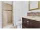 Bathroom with shower, toilet and vanity at 13250 Ridge Rd # 2-1, Largo, FL 33778
