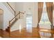 Spacious living room with hardwood floors and a view of the backyard at 17929 Timber View St, Tampa, FL 33647