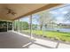 Spacious screened-in porch overlooking a tranquil lake at 17929 Timber View St, Tampa, FL 33647
