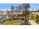 Aerial view of a single-story home with landscaping and a driveway at 245 44Th Ave, St Pete Beach, FL 33706