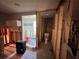 Bathroom under construction highlights stud framing, tile flooring, and a newly tiled shower at 3960 Headsail Dr, New Port Richey, FL 34652