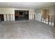 Spacious living room featuring tile flooring and open floor plan, ready for renovation and customization at 3960 Headsail Dr, New Port Richey, FL 34652