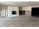 Living room boasting a fireplace, tile flooring, and an open layout, ready for customization at 3960 Headsail Dr, New Port Richey, FL 34652