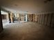 An open room with stud framing, offering possibilities for a flexible floor plan at 3960 Headsail Dr, New Port Richey, FL 34652
