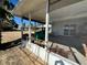 View of the screened porch from the backyard at 3960 Headsail Dr, New Port Richey, FL 34652