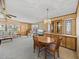 Open concept living and dining space with ample natural light at 4000 William Hume Dr, Zephyrhills, FL 33541