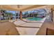 Relaxing screened-in pool area with water view at 5962 Leeland S St, St Petersburg, FL 33715