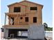 An in-progress build of a two story home showing cinder block foundation and wood frame at 840 61St Ne Ave, St Petersburg, FL 33703