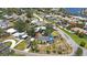 This home features proximity to a serene neighborhood, complete with lush landscaping, and is near a winding street at 8474 Tobay N Rd, St Petersburg, FL 33702