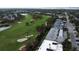 Aerial view showcasing the property's proximity to a golf course at 921 Osceola Rd, Belleair, FL 33756