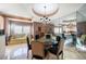 Charming dining room with glass-top table and seating for six at 921 Osceola Rd, Belleair, FL 33756