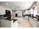 Spacious kitchen featuring granite countertops, stainless steel appliances, and ample cabinetry at 921 Osceola Rd, Belleair, FL 33756