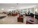 Spacious living room with hardwood floors, fireplace and ample natural light at 921 Osceola Rd, Belleair, FL 33756