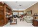 Spacious office with built-in bookcases and comfortable seating at 921 Osceola Rd, Belleair, FL 33756