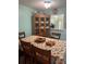 Charming dining area with view into the kitchen at 9218 Mission Oaks Blvd # E, Seminole, FL 33776