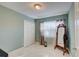 Light and bright bedroom with mirrored closet doors at 1008 Chester Dr, Clearwater, FL 33756