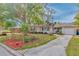 Charming single story home with landscaped front yard and driveway at 1008 Chester Dr, Clearwater, FL 33756