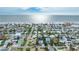 Aerial view of the property and neighborhood near the beach at 16202 3Rd St E, Redington Beach, FL 33708