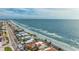 Aerial view of beachfront homes and road at 16202 3Rd St E, Redington Beach, FL 33708