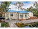 Back of house with storm damage and pool at 16202 3Rd St E, Redington Beach, FL 33708