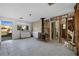 Renovation project: Living room with wood-burning stove and tiled floor at 16202 3Rd St E, Redington Beach, FL 33708