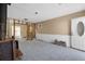 Living room undergoing renovation with exposed framing and a wood-burning stove at 16202 3Rd St E, Redington Beach, FL 33708