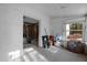 Sunroom with tiled floors and a view of the backyard at 16202 3Rd St E, Redington Beach, FL 33708