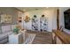 Common area with sectional sofa and built-in shelving at 18424 Vista Park Ter, Venice, FL 34293
