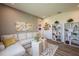 Bright common area with sectional sofa and stylish decor at 18424 Vista Park Ter, Venice, FL 34293
