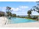 Community pool overlooking the river at 2113 Sunset Wind Loop, Oldsmar, FL 34677