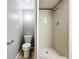 Clean bathroom with toilet and a tiled shower stall at 2358 Havana Dr, Clearwater, FL 33764