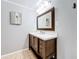 Bathroom featuring a vanity with a quartz countertop at 2358 Havana Dr, Clearwater, FL 33764