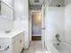 Updated bathroom with a bathtub and access to another room at 2358 Havana Dr, Clearwater, FL 33764