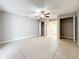 Spacious bedroom with tile floors, ceiling fan and double closets at 2358 Havana Dr, Clearwater, FL 33764