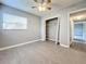 Bedroom with ceiling fan, closet and access to hallway at 2358 Havana Dr, Clearwater, FL 33764