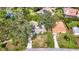 Charming single-story home featuring a well-maintained lawn and mature landscaping at 2358 Havana Dr, Clearwater, FL 33764