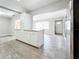 Kitchen with white cabinets, granite countertops and tile floors at 2358 Havana Dr, Clearwater, FL 33764