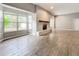 Spacious living room with tile floors and a fireplace at 2358 Havana Dr, Clearwater, FL 33764