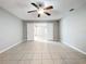 Bright living room with gray walls, wood-look floors, and a bay window at 2358 Havana Dr, Clearwater, FL 33764